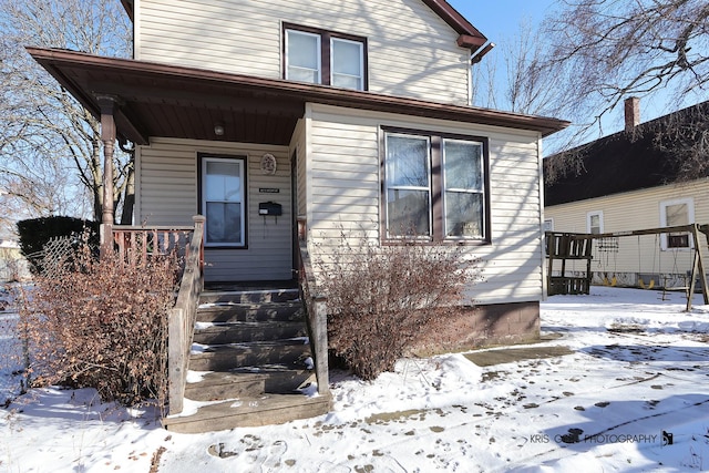 view of front of house with covered porch