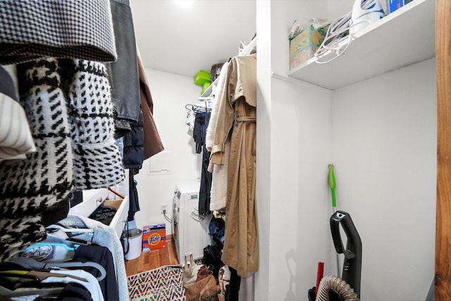 walk in closet featuring hardwood / wood-style flooring