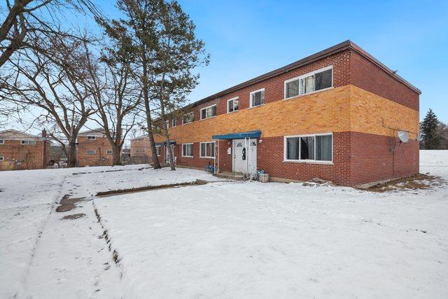 view of snow covered house