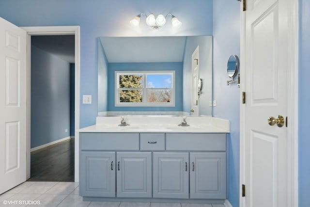 bathroom featuring tile patterned floors and vanity