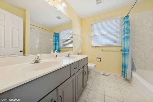 full bathroom with tile patterned floors, shower / bath combination with curtain, toilet, and vanity