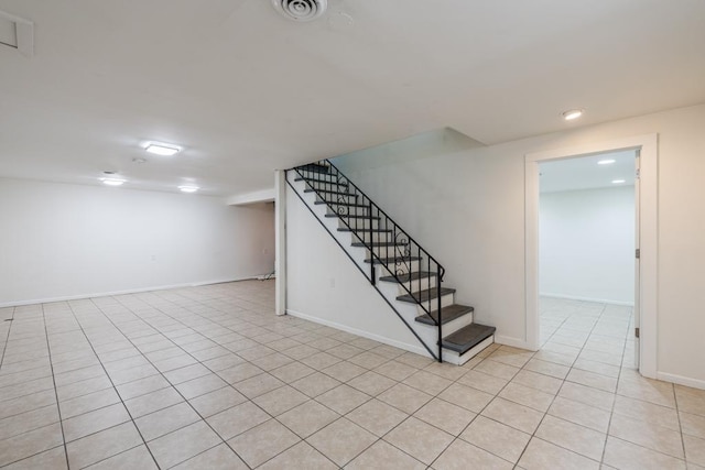 interior space featuring light tile patterned floors