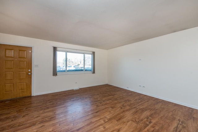 entryway with hardwood / wood-style floors