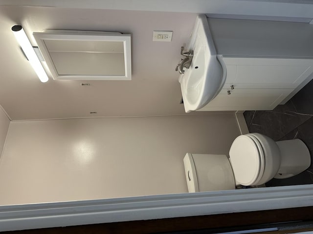 bathroom featuring toilet