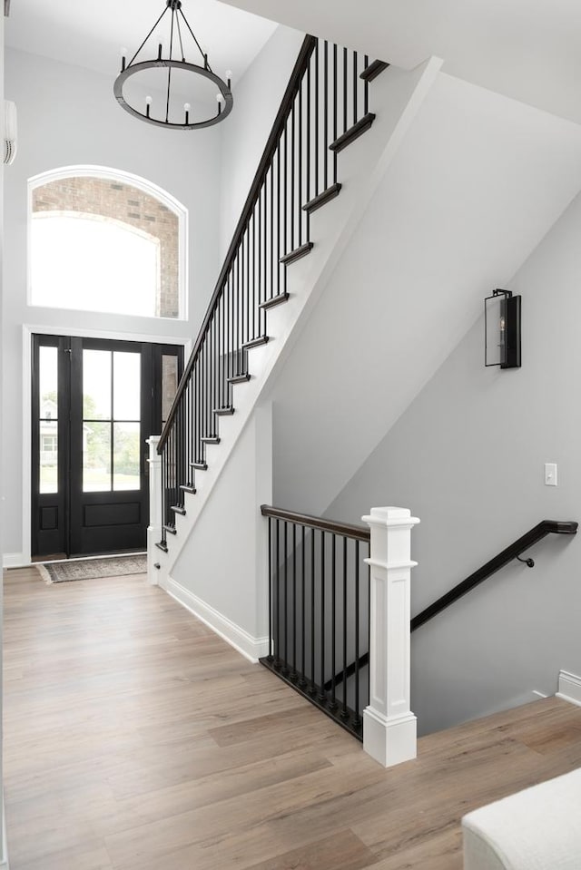 foyer entrance with light hardwood / wood-style floors