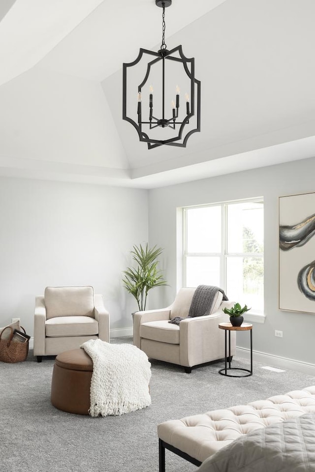 living room featuring a notable chandelier, high vaulted ceiling, and carpet flooring