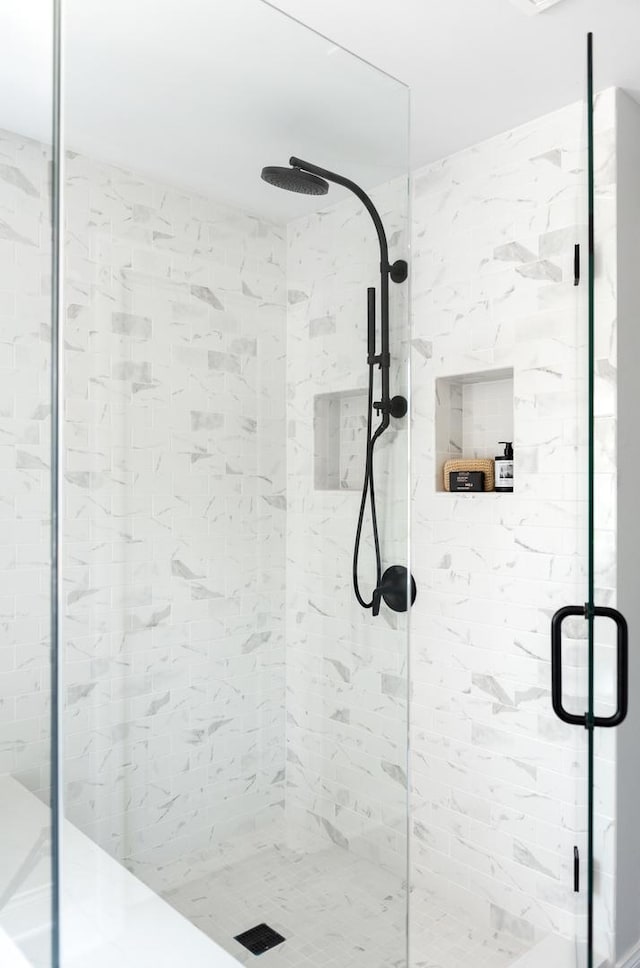 bathroom with an enclosed shower