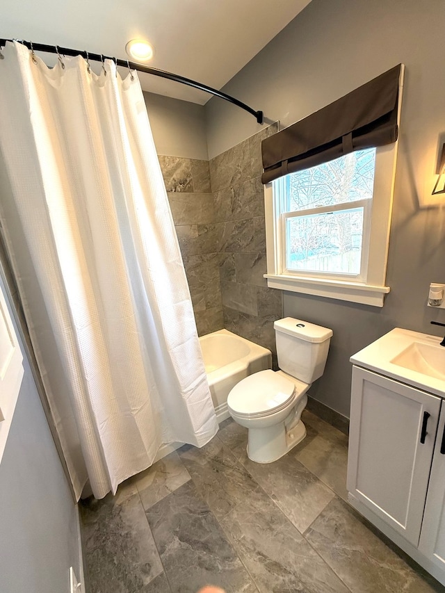 full bathroom with toilet, vanity, and shower / bath combination with curtain