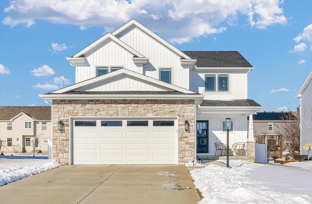 craftsman inspired home with a garage