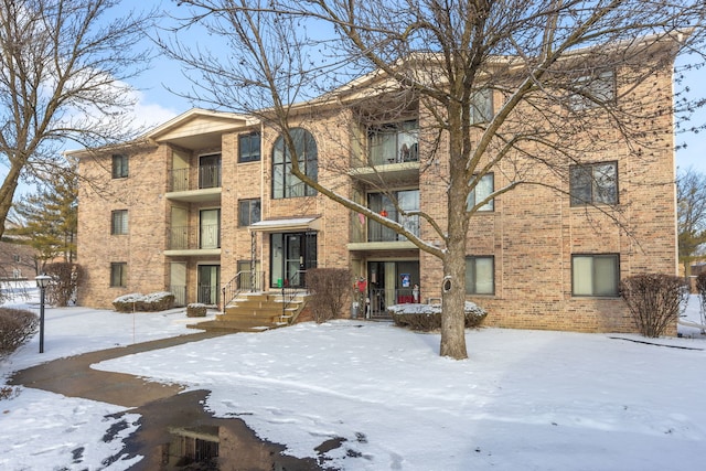 view of snow covered property