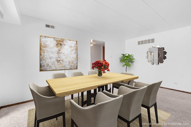 view of carpeted dining room