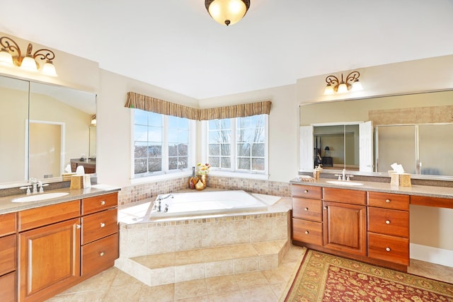 bathroom with vaulted ceiling, vanity, plus walk in shower, and tile patterned flooring