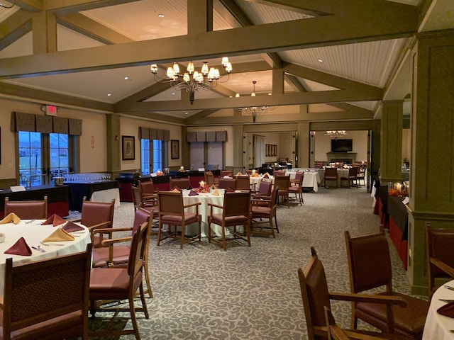 dining space with high vaulted ceiling, french doors, beamed ceiling, and an inviting chandelier