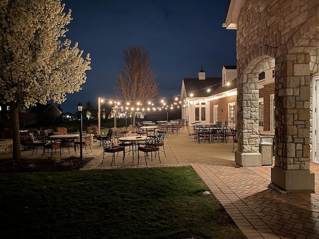 view of patio at night