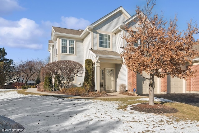 view of front of property with a garage