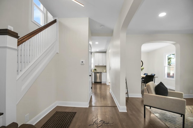 foyer with dark hardwood / wood-style flooring