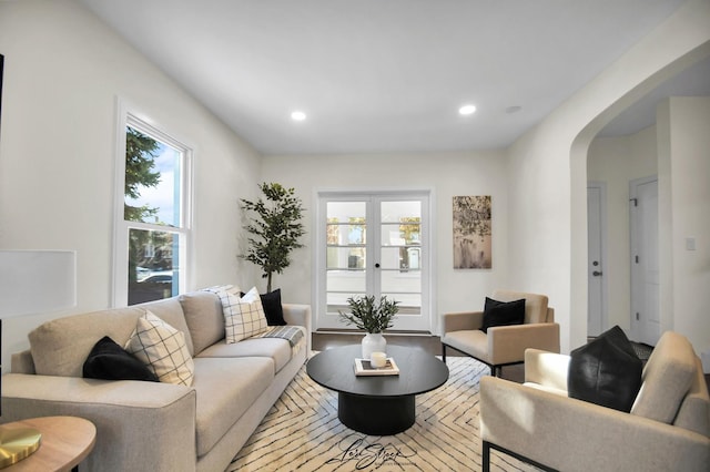 living room featuring french doors and wood-type flooring