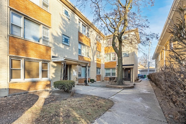 surrounding community featuring a patio area