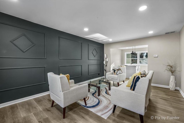 living room with hardwood / wood-style floors