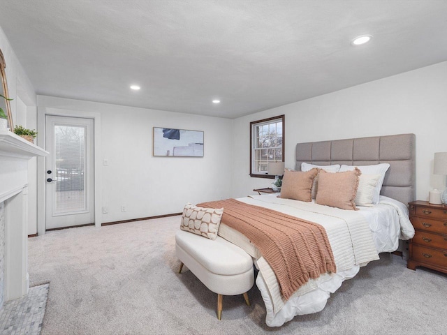 carpeted bedroom featuring access to outside