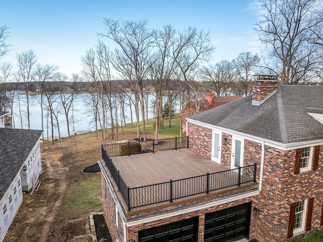 deck featuring a water view