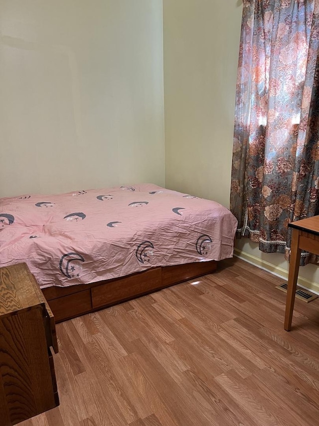 bedroom featuring light hardwood / wood-style flooring