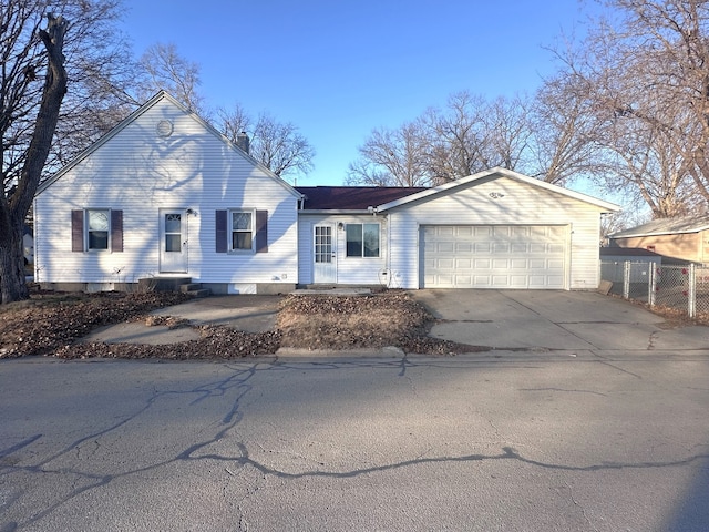 ranch-style home featuring a garage