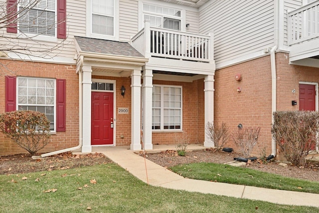 doorway to property with a balcony