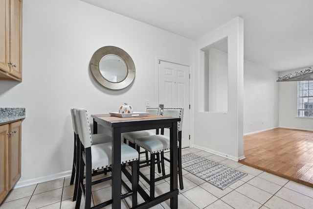 dining room with light tile patterned floors