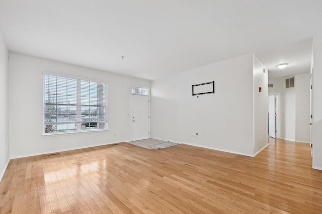 interior space with light hardwood / wood-style floors