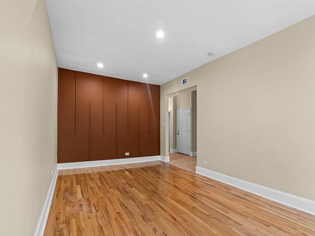 empty room featuring light hardwood / wood-style floors