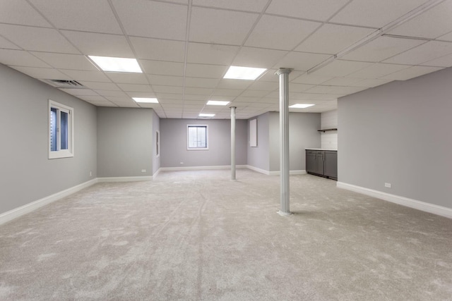 basement with light colored carpet