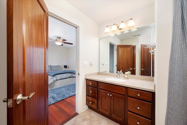 bathroom with vanity, tile patterned floors, and ceiling fan