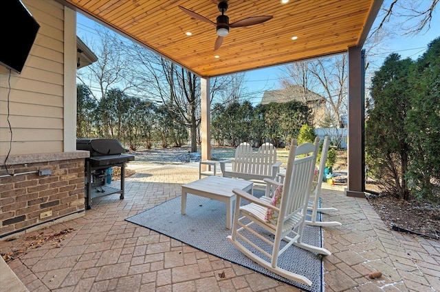 view of patio / terrace with grilling area and ceiling fan