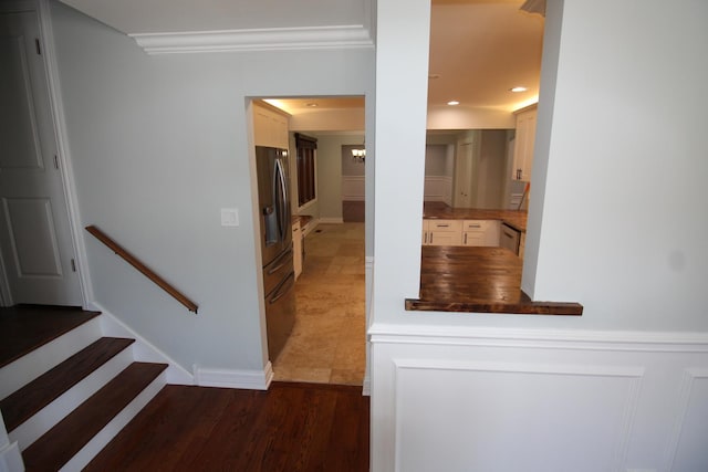 hallway with dark hardwood / wood-style floors