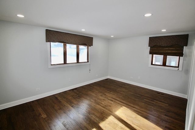 empty room featuring wood-type flooring