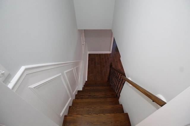 staircase featuring hardwood / wood-style flooring