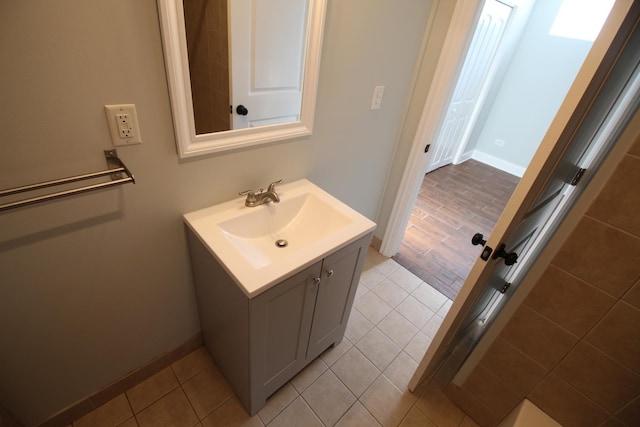 bathroom featuring tile patterned floors and vanity