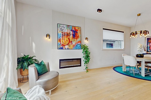 interior space with hardwood / wood-style flooring and a notable chandelier