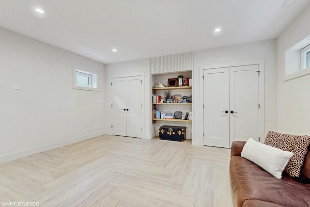 living room with light parquet floors