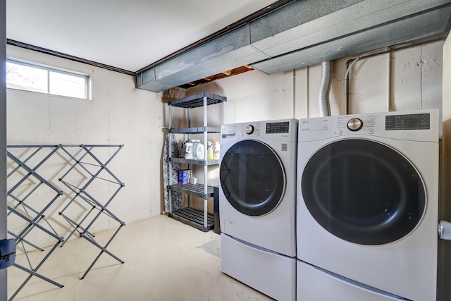 washroom featuring washer and dryer