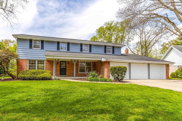 1712 Shawnee Trl, Northbrook, IL 60062 - traditional-style home with driveway, a garage, brick siding, and a front yard
