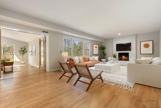 1712 Shawnee Trl, Northbrook, IL 60062 - living room with a brick fireplace, light wood-type flooring, baseboards, and recessed lighting