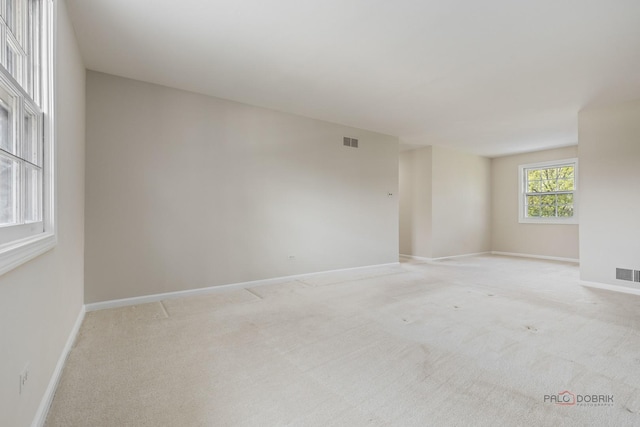 1712 Shawnee Trl, Northbrook, IL 60062 - spare room featuring light colored carpet and baseboards