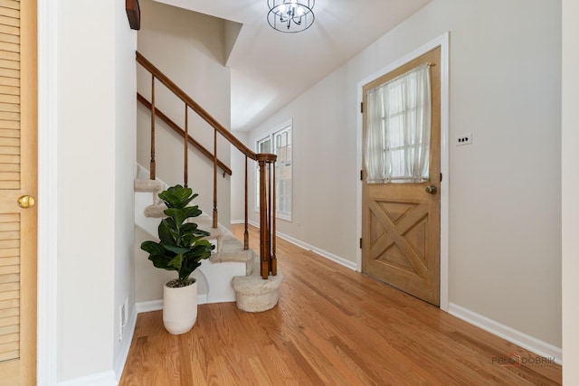 1712 Shawnee Trl, Northbrook, IL 60062 - foyer entrance featuring stairway, wood finished floors, and baseboards