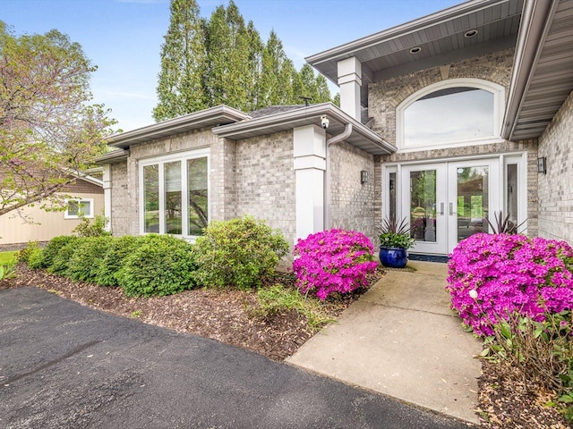 223 Lake Summerset Rd, Davis, IL 61019 - property entrance with french doors and brick siding