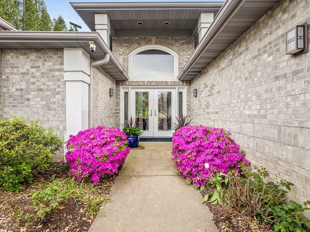 223 Lake Summerset Rd, Davis, IL 61019 - entrance to property with french doors and brick siding