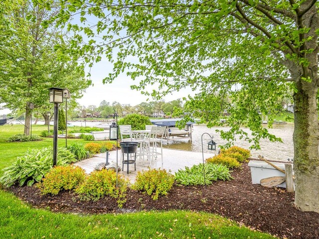 223 Lake Summerset Rd, Davis, IL 61019 - surrounding community with a patio