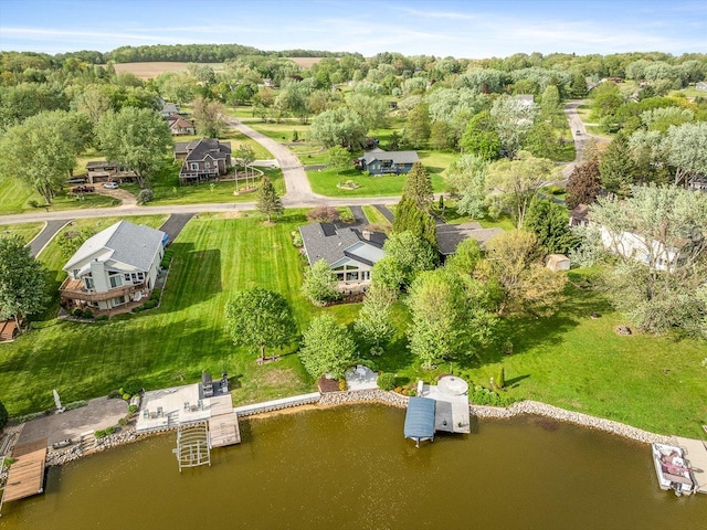 223 Lake Summerset Rd, Davis, IL 61019 - aerial view of property and surrounding area with a nearby body of water, nearby suburban area, and a tree filled landscape