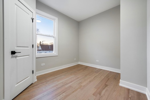 empty room with light wood-type flooring